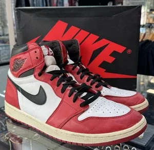 Air Jordan 1 High sneakers in the red, white and black Chicago colorway with the Nike box