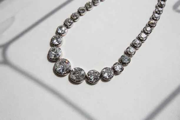 Diamond tennis necklace with graduated round-cut stones set in white gold
