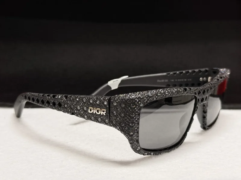 Black Dior sunglasses with a sparkle finish