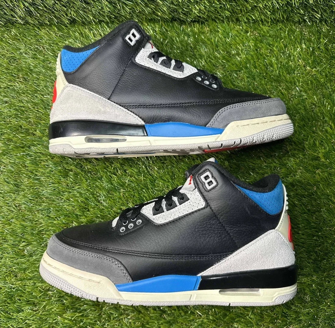 Pair of black, grey and blue Air Jordan 3 sneakers