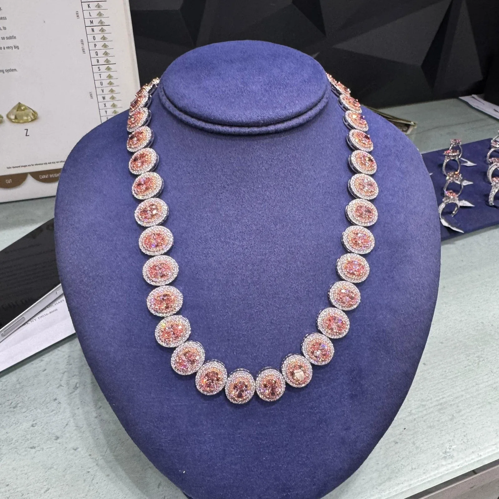 Natural fancy color diamond necklace with GIA color grading scale