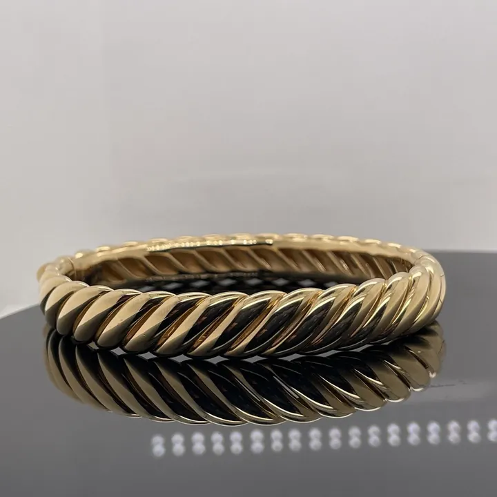 Yellow gold twisted cable bangle bracelet