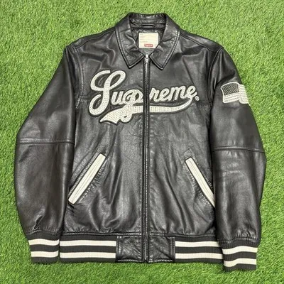 Black Supreme leather varsity jacket with the Supreme script logo