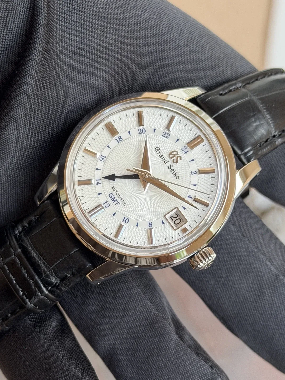 Grand Seiko GMT automatic watch on a wrist